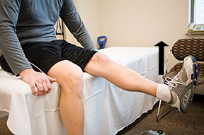 moving the knee into extension